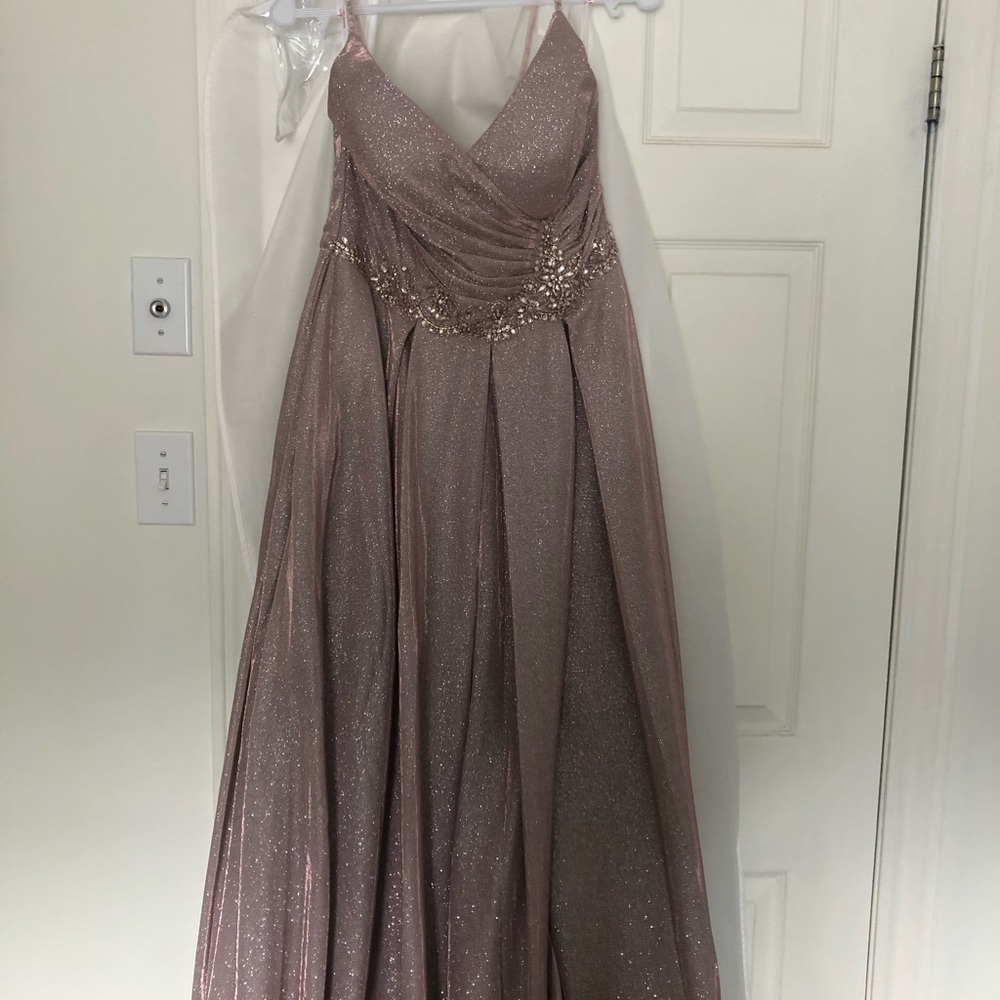Evening dress ,  thin straps shiny slit infront very classy. Wore once